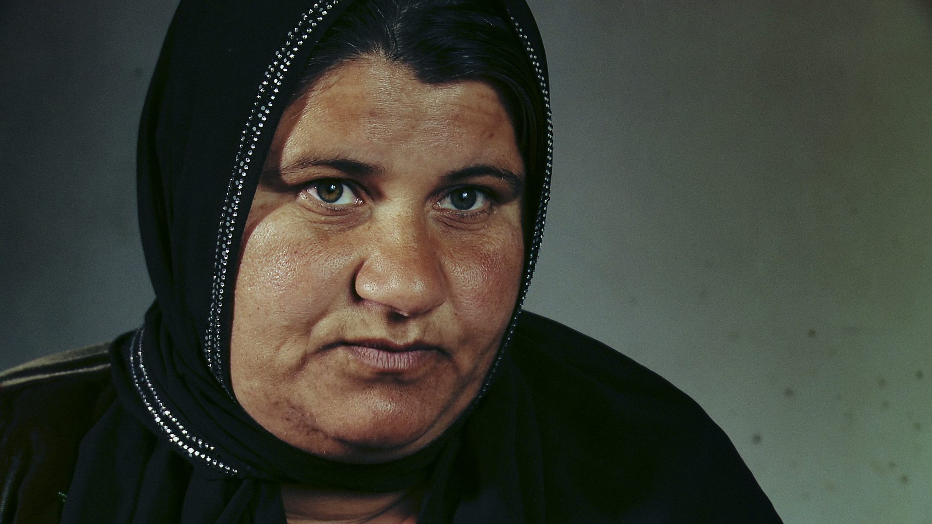 AISHA MAGHDID MAHMOUD witnessed the chemical bombing of Ware village in 1988. Panic-stricken villagers ran to the local spring to wash themselves and their children. However, the water was poisoned and 20 lost their lives. Unaware that Aisha, her brother and her mother had escaped, her father searched desperately for them in the village and never returned. 