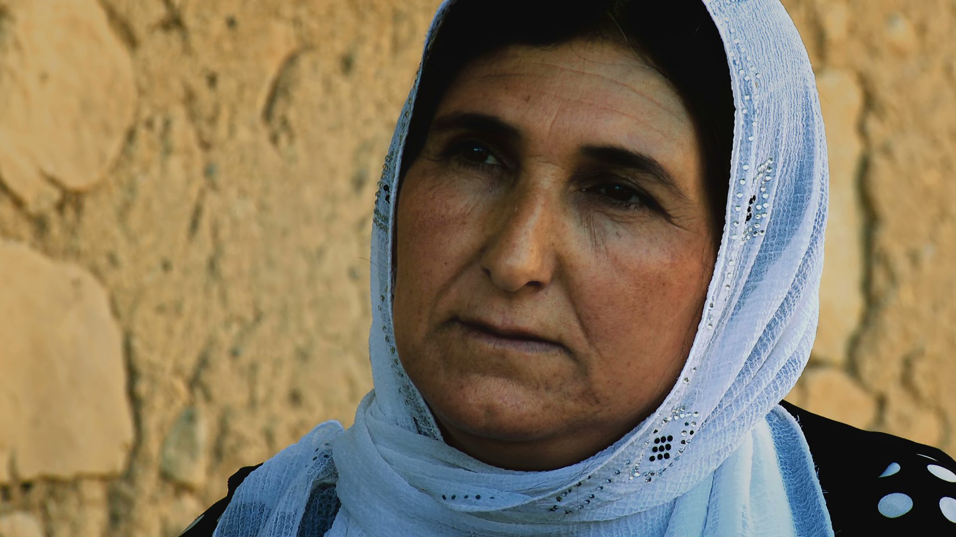 Despite a chemical attack on Askar in May 1988, SAEDA OMAR RASUL stayed behind in her village whilst many fled. She was pregnant and had already lost one child in an attack, but with animals and birds dying around her she escaped to the nearby mountains. 