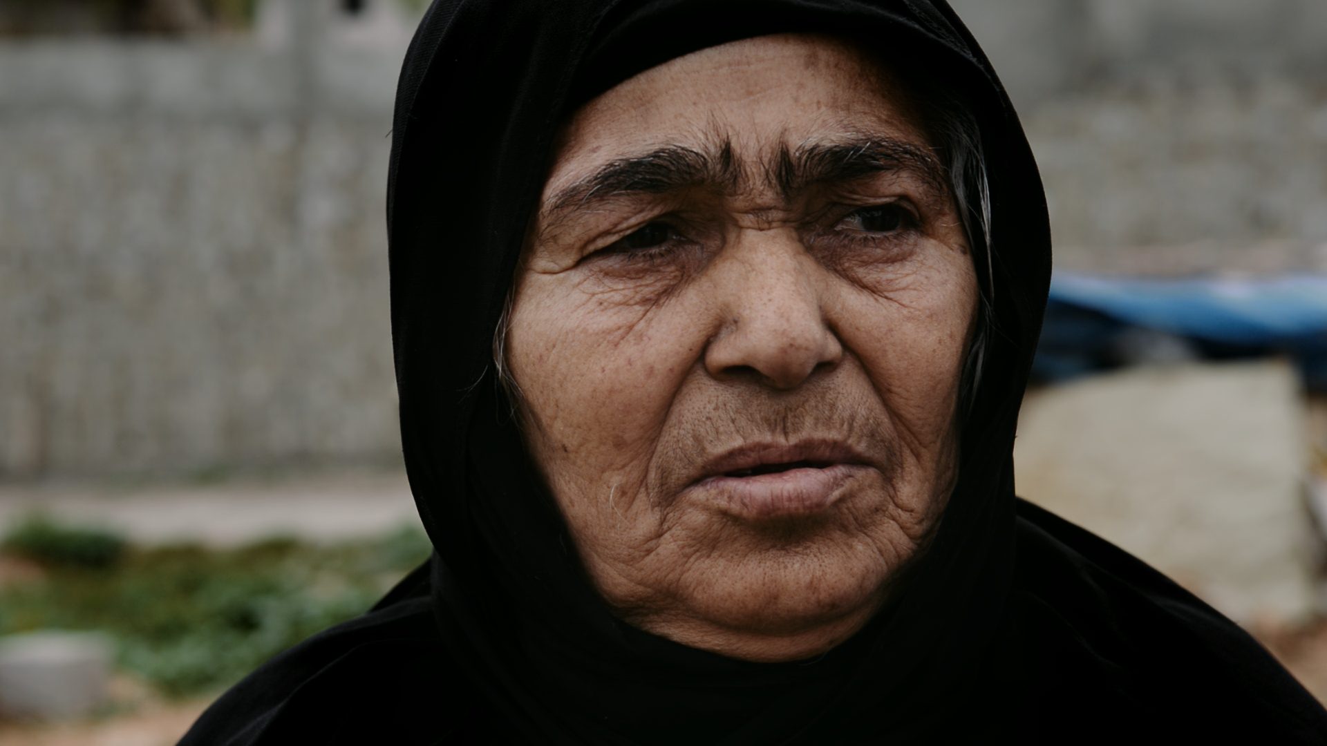 DOCTOR BAYAN RASUL reminisces with the Barzani women who she helped after their men were abducted in 1983. They describe themselves as “the living dead,” but say Doctor Bayan was like a mother to them. The women say they now feel inwardly calm and reassured knowing that their men’s remains and belongings are back with them in Barzan. 